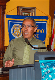 Photo of Joel Reyes speaking at Rotary Club