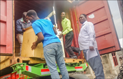 photo showing ICC Congo staffers unloading the container shipped from Prolasa Canada to the DR Congo