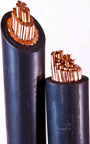 A photo showing the type of rubber-coated, heavy-duty copper cable used for powerlines that transfer electricity to your home. The cable has be cut in half exposing the copper wire that makes up the core of the cable