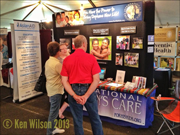 Photo of of ICC booth at the 2013 Oregon conference campmeeting in Gladstone, OR.